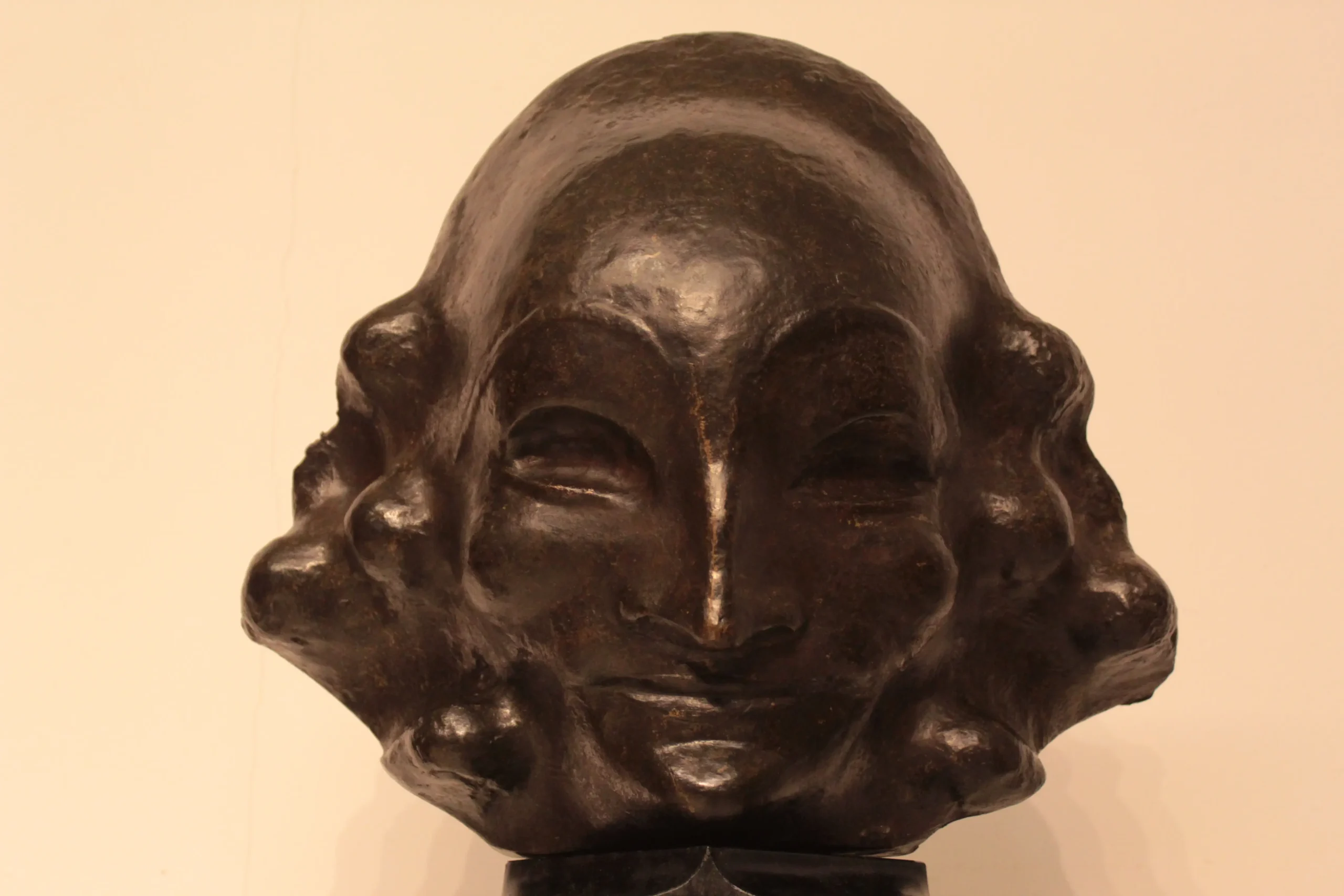 Bronzen masker John Raedecker Amsterdamse School